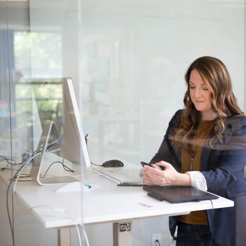 Woman using standing desk