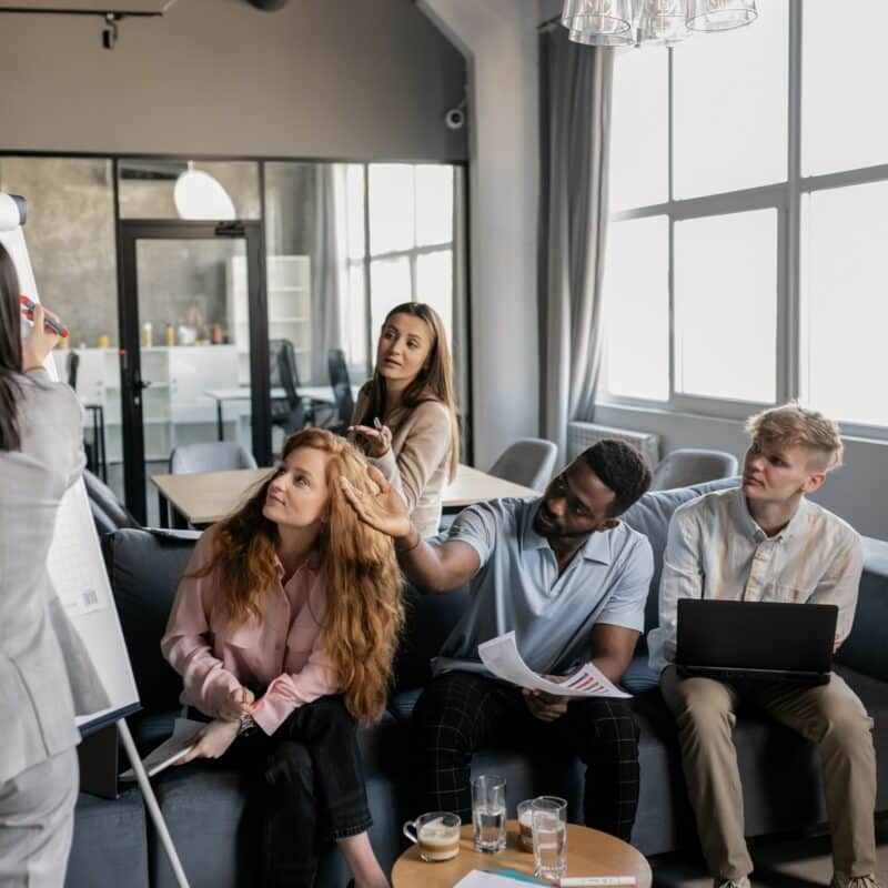 Staff discussing Return To Office plan