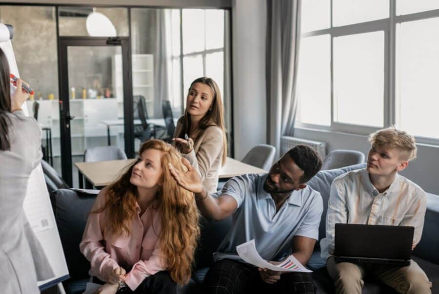 Staff discussing Return To Office plan