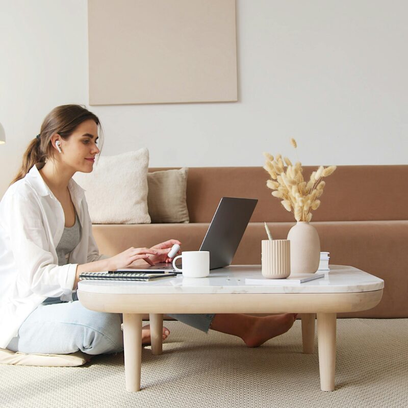 Woman WFH in yoga pose